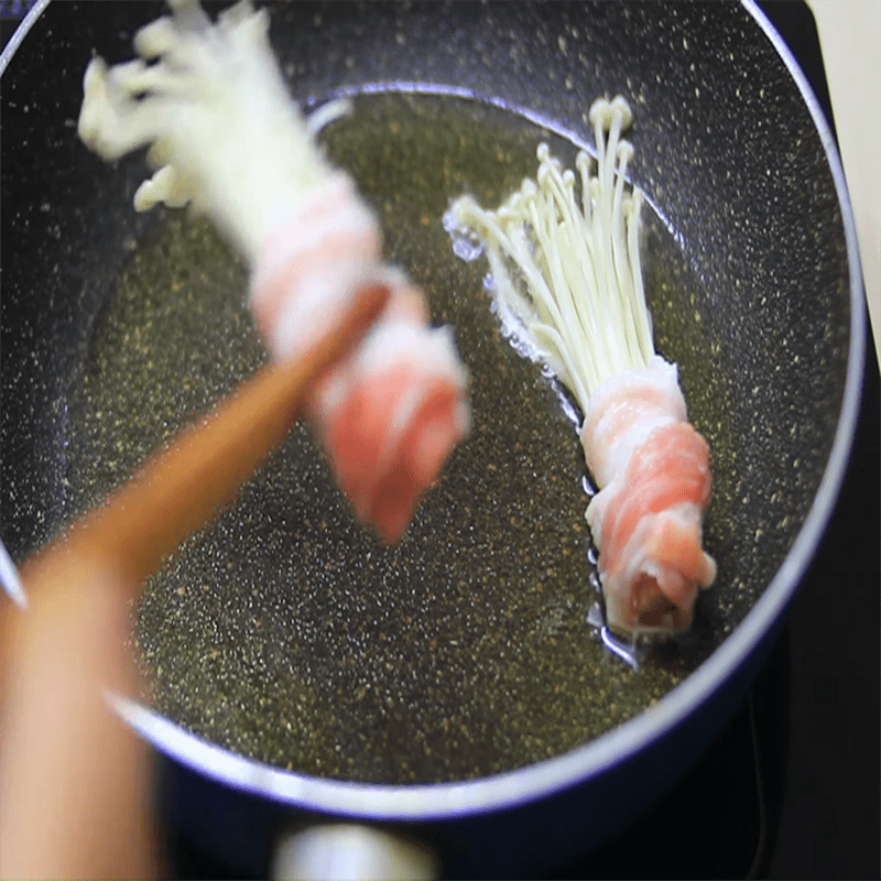 Step 4 Sear the pork belly Rolled pork belly with enoki mushrooms