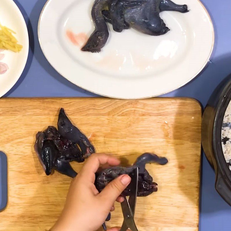 Step 1 Prepare and marinate the black chicken for Black Chicken and Mung Bean Porridge