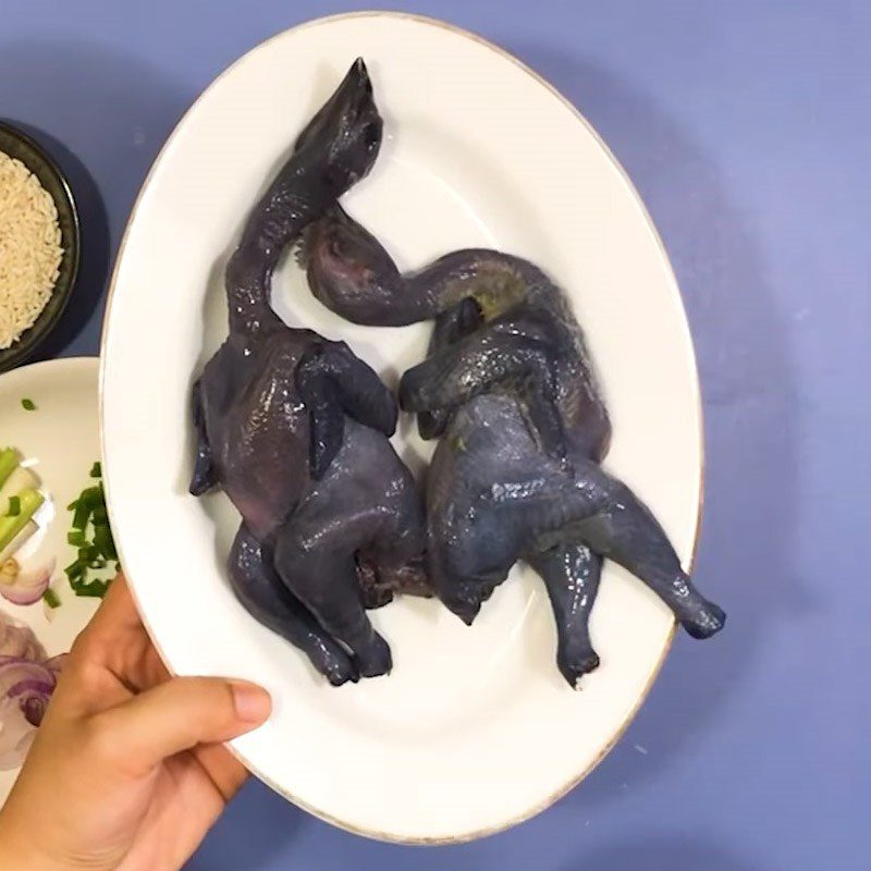 Step 1 Prepare and marinate the black chicken for Black Chicken and Mung Bean Porridge