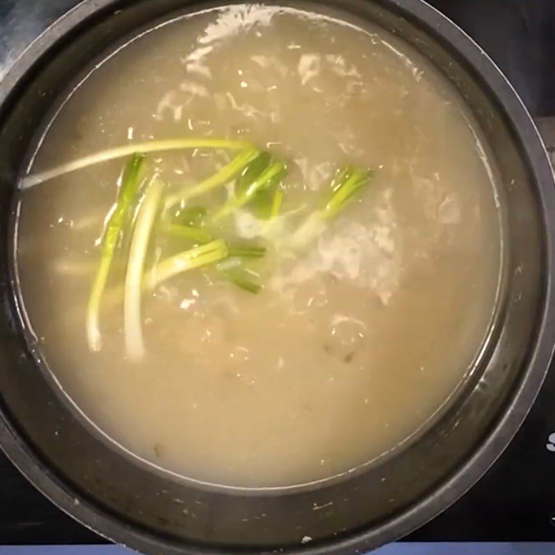 Step 5 Add oysters to the porridge Porridge with green beans and oysters