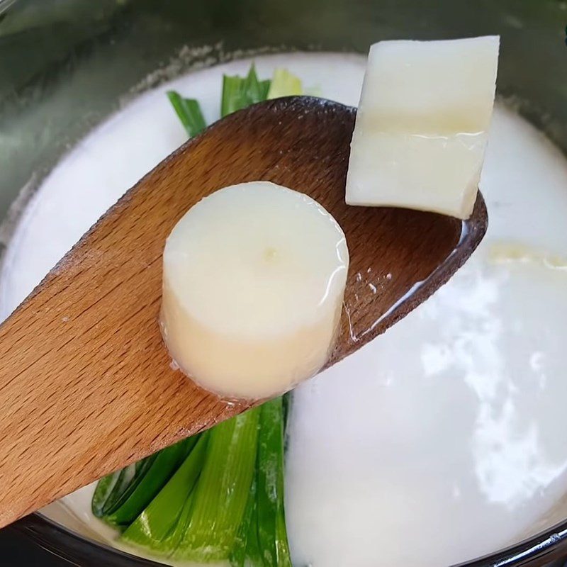 Step 3 Cook cassava with coconut milk for banana and cassava pudding