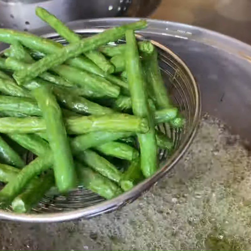Step 2 Fry the green beans and eggplant for Stir-fried Green Beans with Eggplant