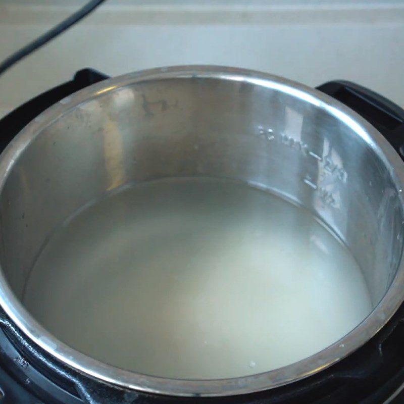 Step 1 Prepare Rice (wash, cook rice hot) Chicken Porridge using a pressure cooker