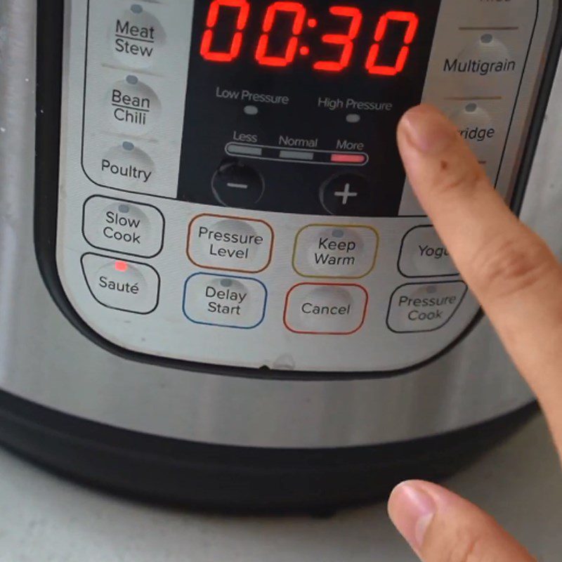 Step 1 Prepare Rice (wash, cook rice hot) Chicken Porridge using a pressure cooker