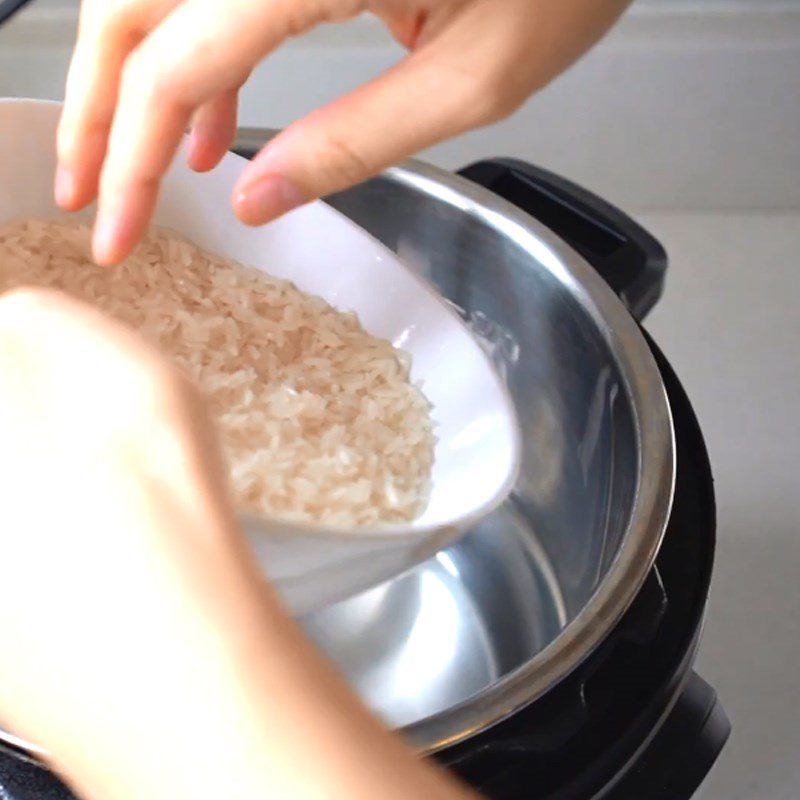 Step 1 Prepare Rice (wash, cook rice hot) Chicken Porridge using a pressure cooker