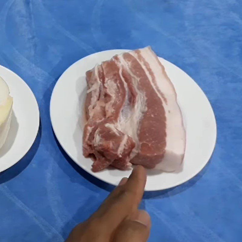 Step 2 Preparing pork for coconut heart stew