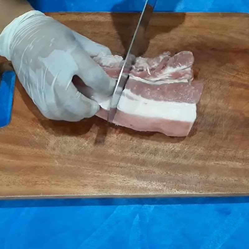 Step 2 Preparing pork for coconut heart stew