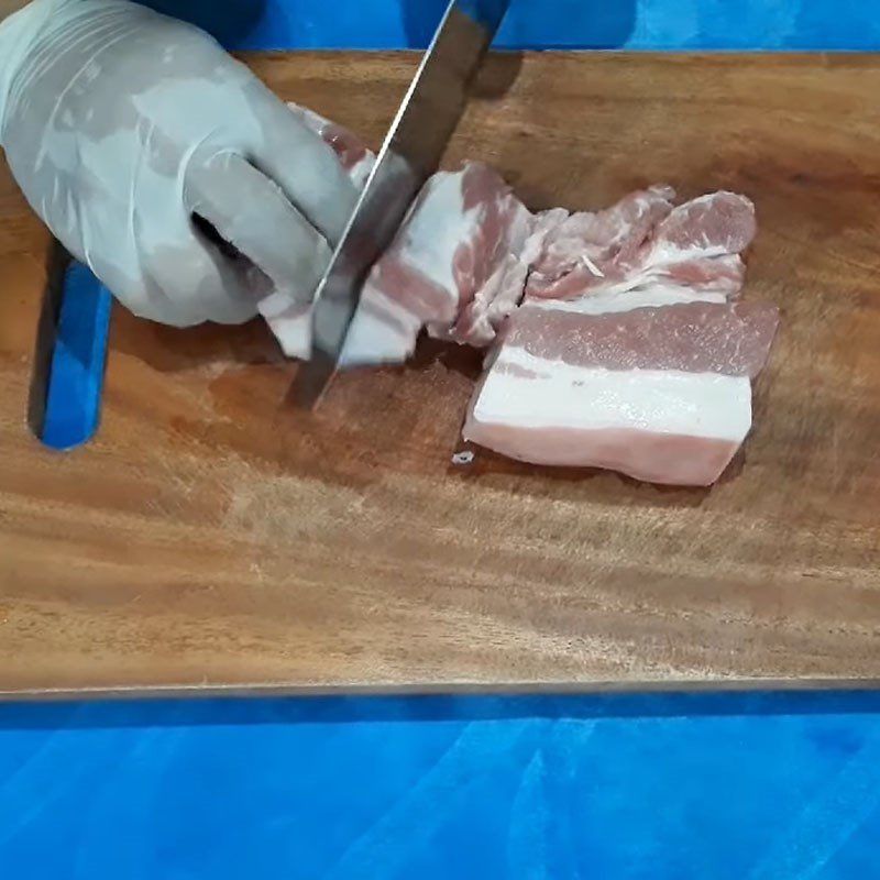 Step 2 Preparing pork for coconut heart stew