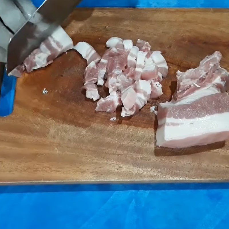 Step 2 Preparing pork for coconut heart stew
