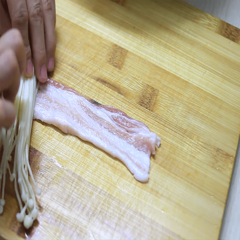 Step 3 Roll the pork belly Rolled pork belly with enoki mushrooms