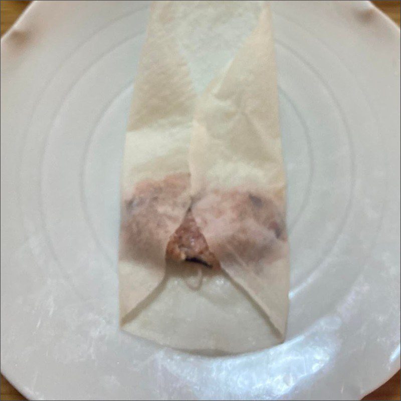 Step 2 Rolling and frying spring rolls and making dipping sauce How to make bun cha gio with homemade spring rolls