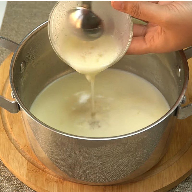 Step 2 Heat the milk mixture and pour the first layer for Mango Panna Cotta