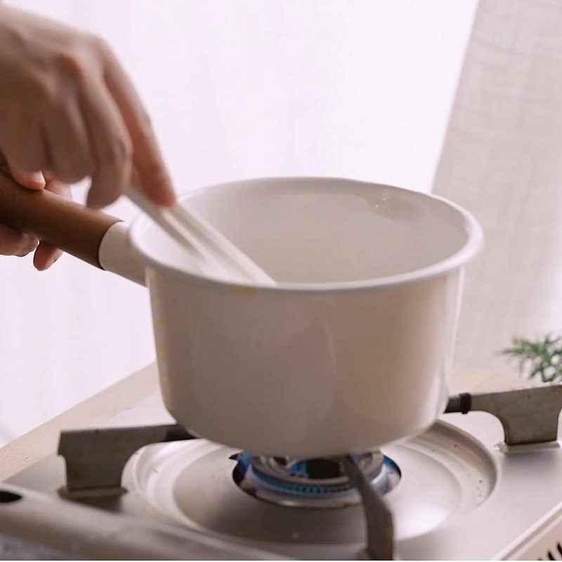 Step 2 Heat the coconut milk mixture for fresh mango Panna cotta