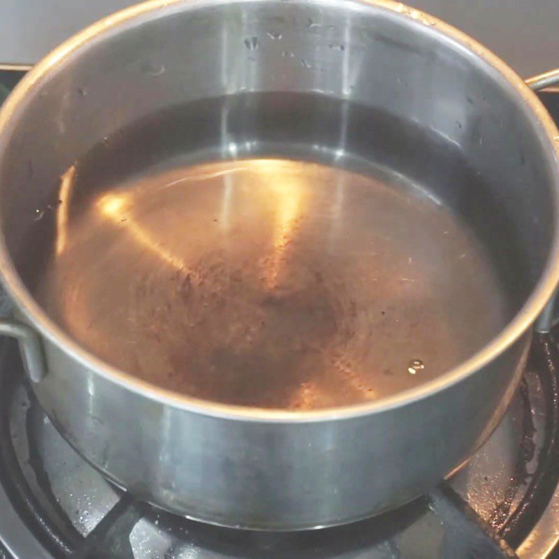 Step 1 Heat the milk Yogurt with condensed milk and powdered milk
