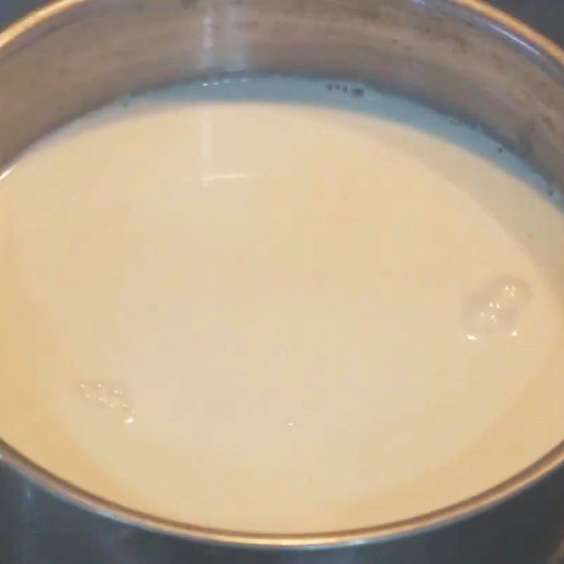 Step 1 Heat the milk Yogurt with condensed milk and powdered milk