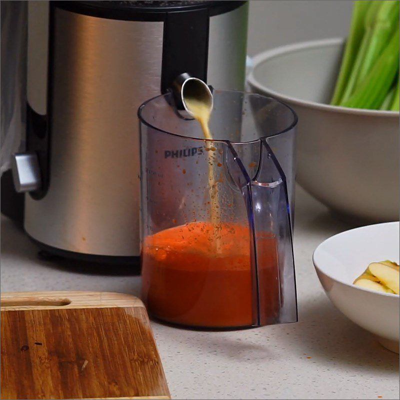 Step 2 Juice the celery, carrot, and apple Celery Apple Carrot Juice