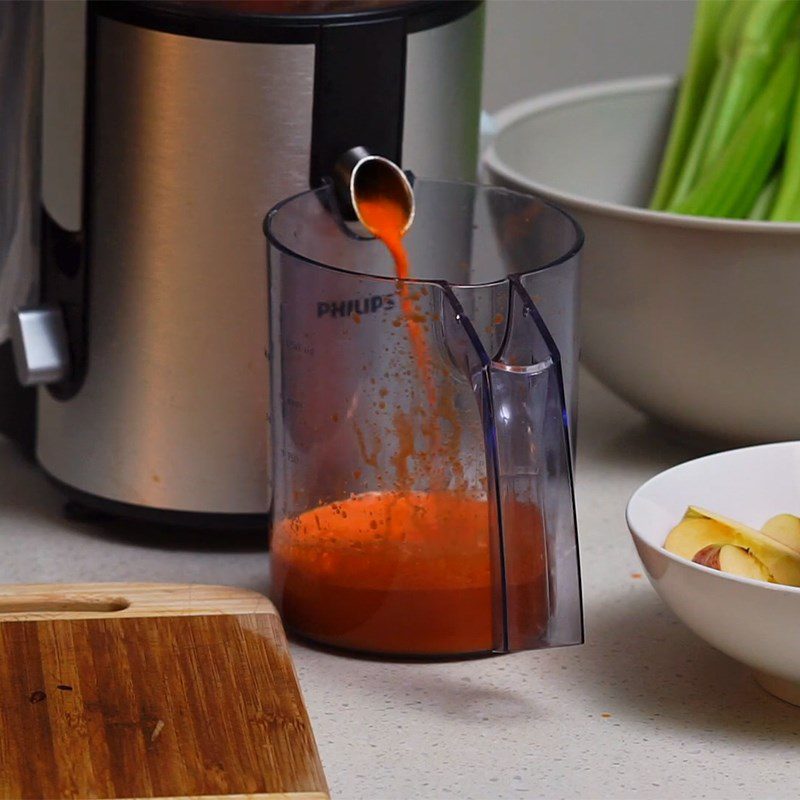 Step 2 Juice the celery, carrot, and apple Celery Apple Carrot Juice