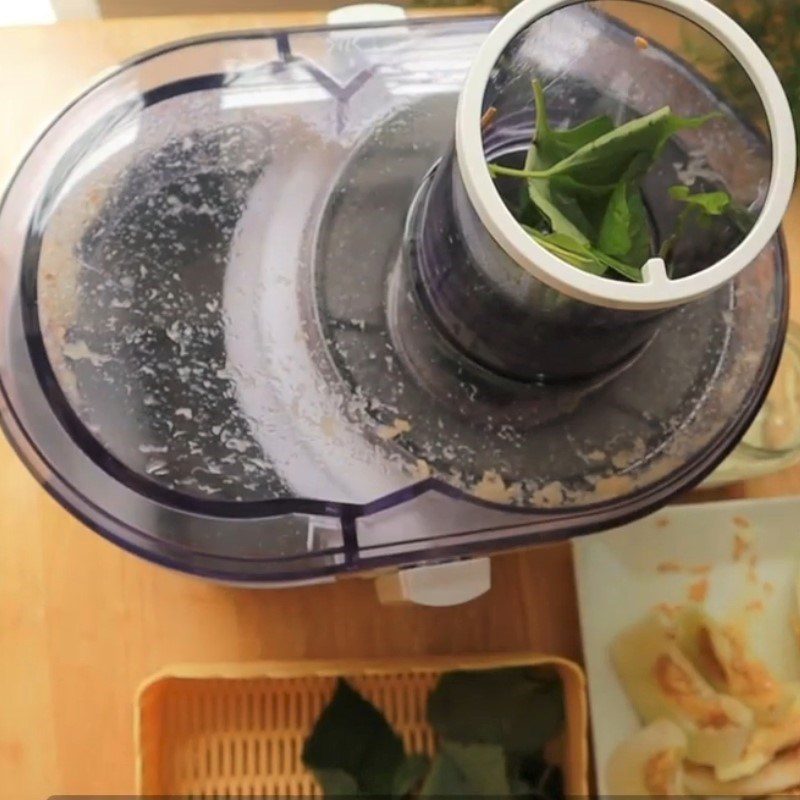 Step 2 Juicing the Fish Mint, Cucumber, and Watermelon for Watermelon Cucumber Juice