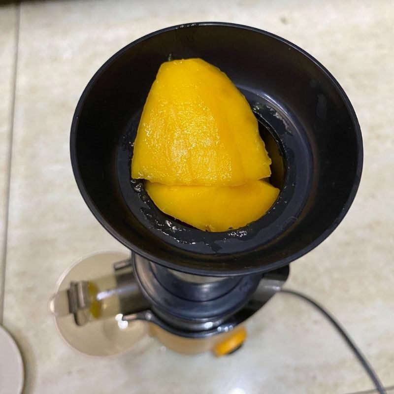 Step 2 Juicing the mango and watermelon for Mango Watermelon Juice