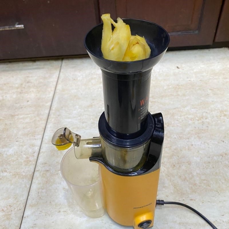Step 2 Juice mango with pineapple for Mango Pineapple Juice