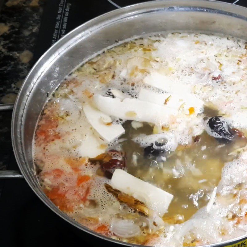 Step 3 Simmering bones and cooking hot pot broth Beef hot pot