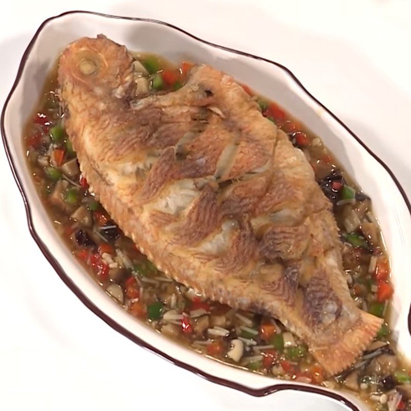 Step 5 Completion of fried red tilapia with mushroom sauce