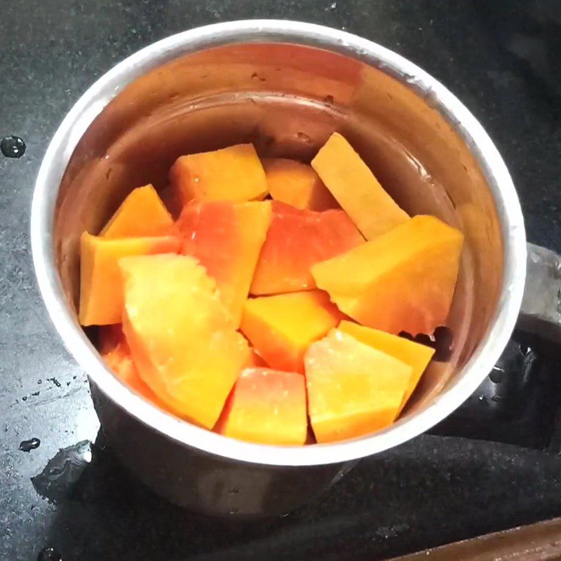 Step 1 Prepare and blend the papaya for Papaya Ice Cream