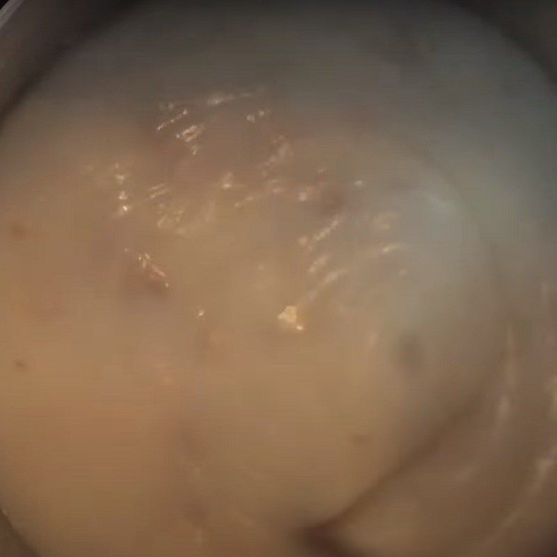 Step 4 Stirring the flour to cook porridge with meat Hanoi rib porridge