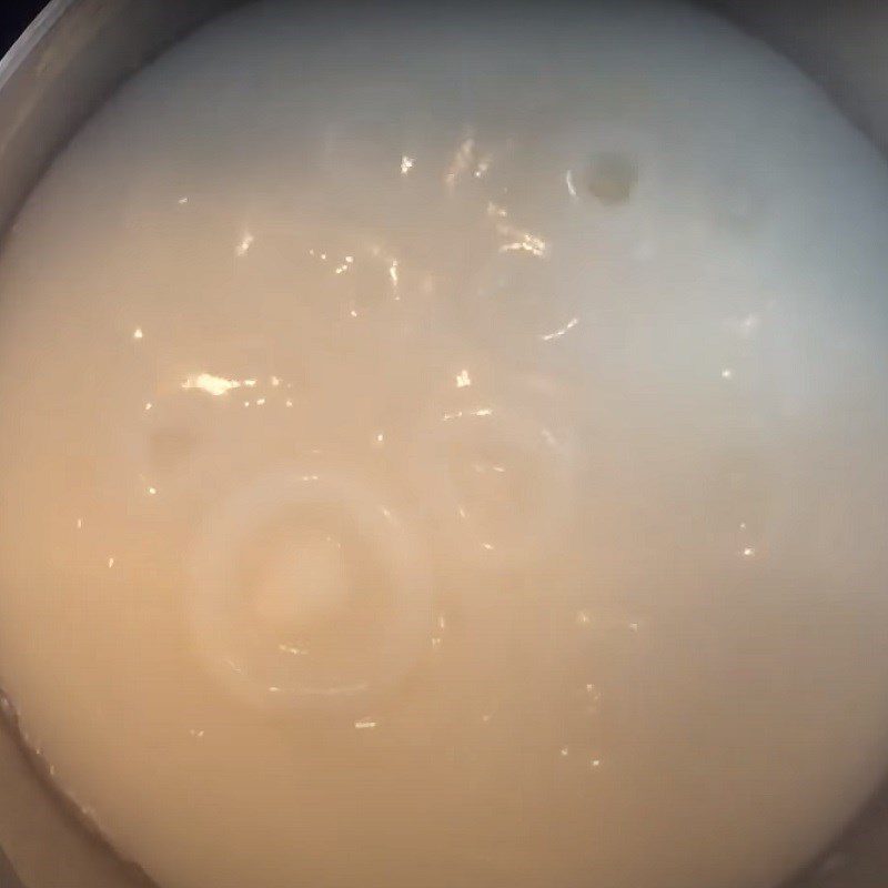 Step 4 Stirring the flour to cook porridge with meat Hanoi rib porridge