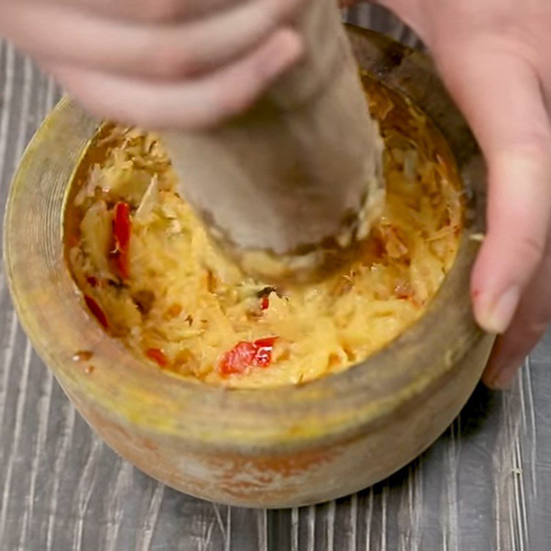 Step 5 Make the dipping sauce for the hot pot Spicy bamboo shoot beef tendon hot pot