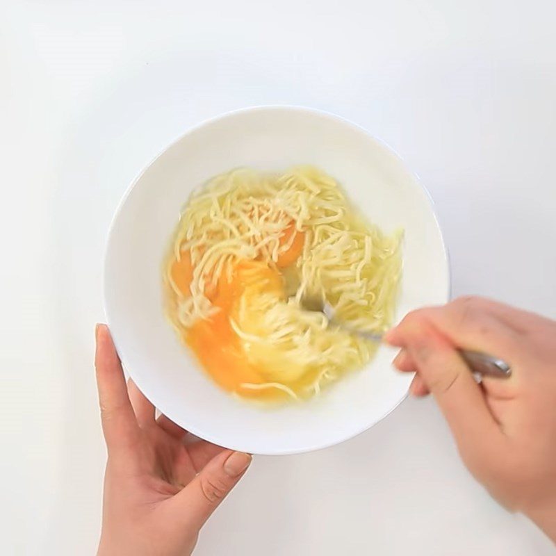Step 1 Take the egg yolk out and mix with cheese Baked cheese eggs