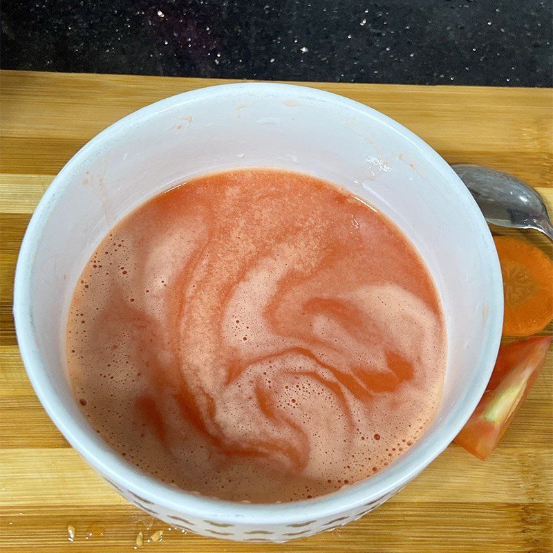 Step 3 Straining the juice Carrot and tomato juice using a blender