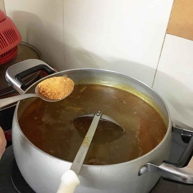 Step 5 Cooking bánh canh Bánh canh gõ gáo dừa with cá lăng fish cake