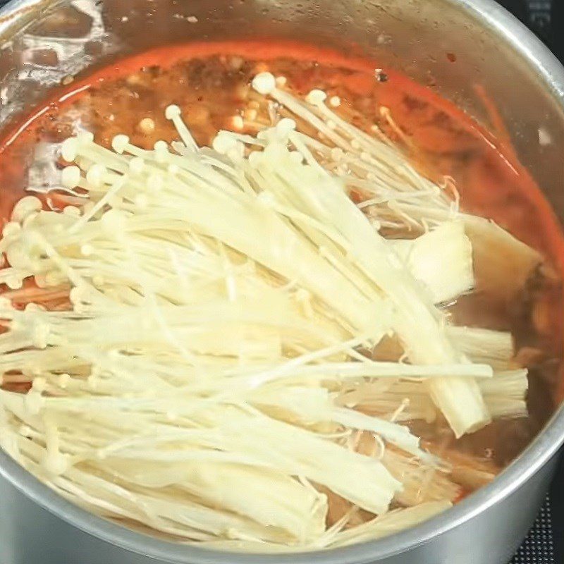 Step 3 Cooking soup Enoki mushroom beef soup