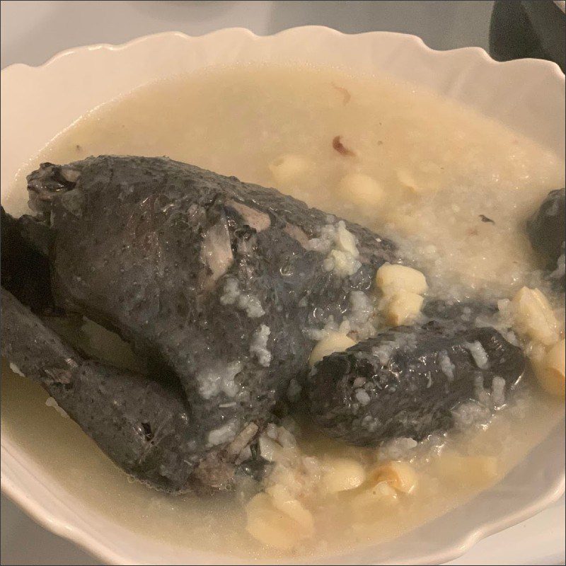 Step 2 Cooking porridge Black chicken porridge with lotus seeds (recipe shared by user)