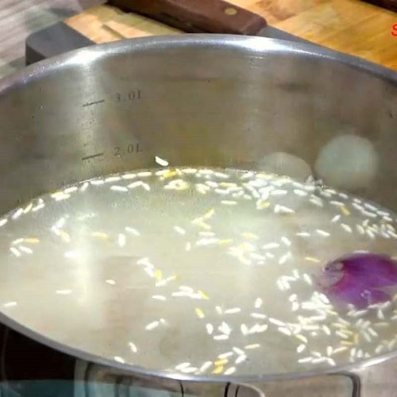 Step 5 Cook the porridge Green bean eel porridge
