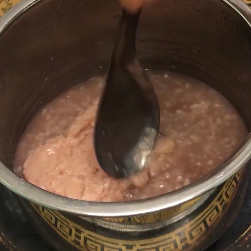 Step 3 Cooking porridge Red bean porridge with pork and zucchini