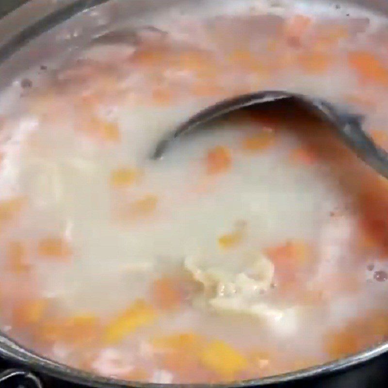 Step 5 Cook the porridge Sea cucumber scallop porridge