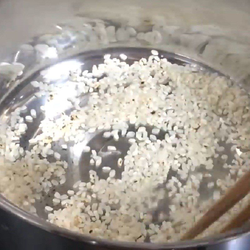 Step 5 Cook the porridge Sea cucumber scallop porridge
