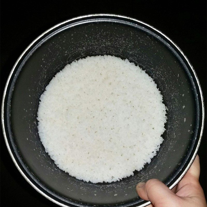 Step 3 Cook quail porridge Quail porridge