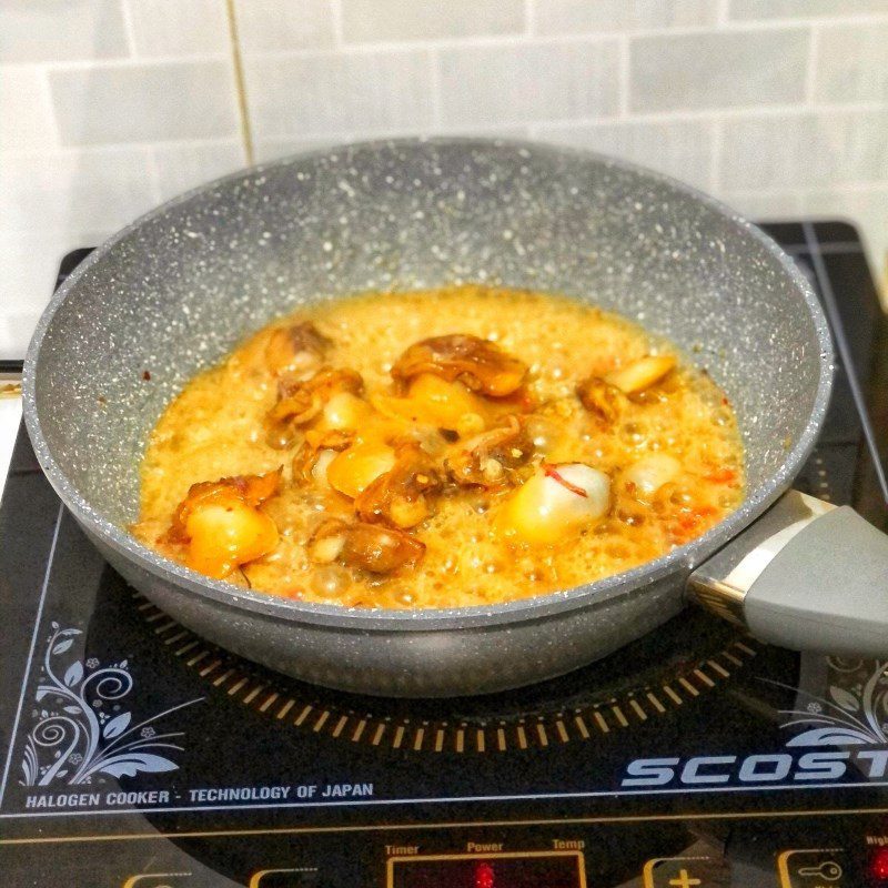 Step 4 Cooking long shell porridge Long shell porridge lotus seed