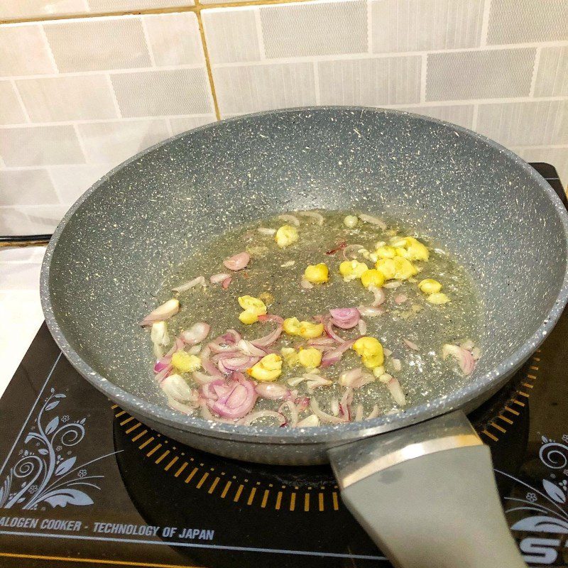 Step 4 Cooking long shell porridge Long shell porridge lotus seed