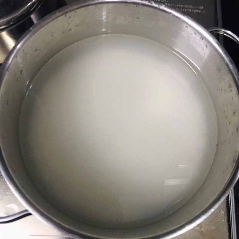Step 2 Cook white porridge Oyster mushroom porridge