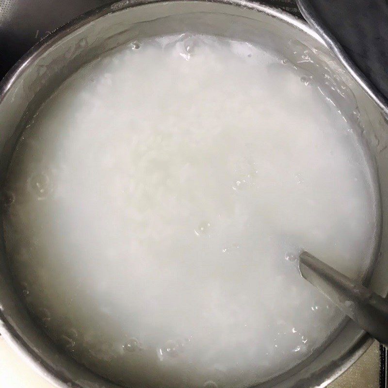Step 2 Cook white porridge Oyster mushroom porridge