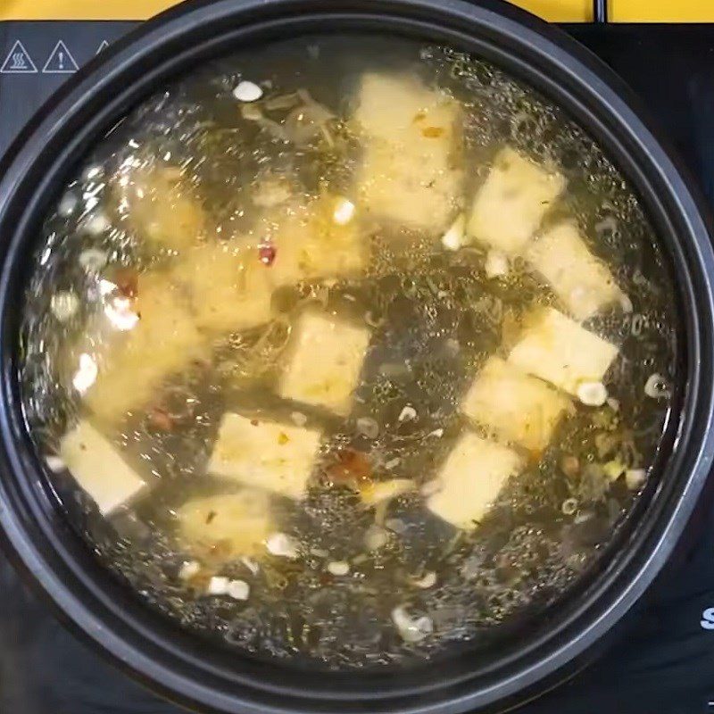 Step 2 Cook soft tofu Enoki mushroom clam soup