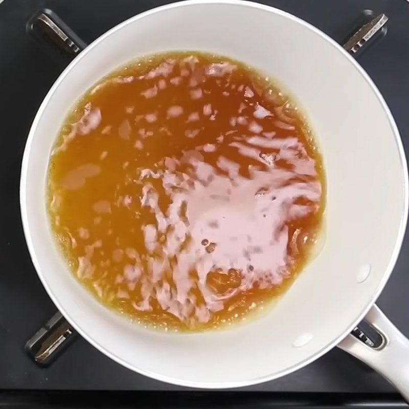 Step 2 Cook the cocoa and coconut cream mixture Western-style baked gan cake
