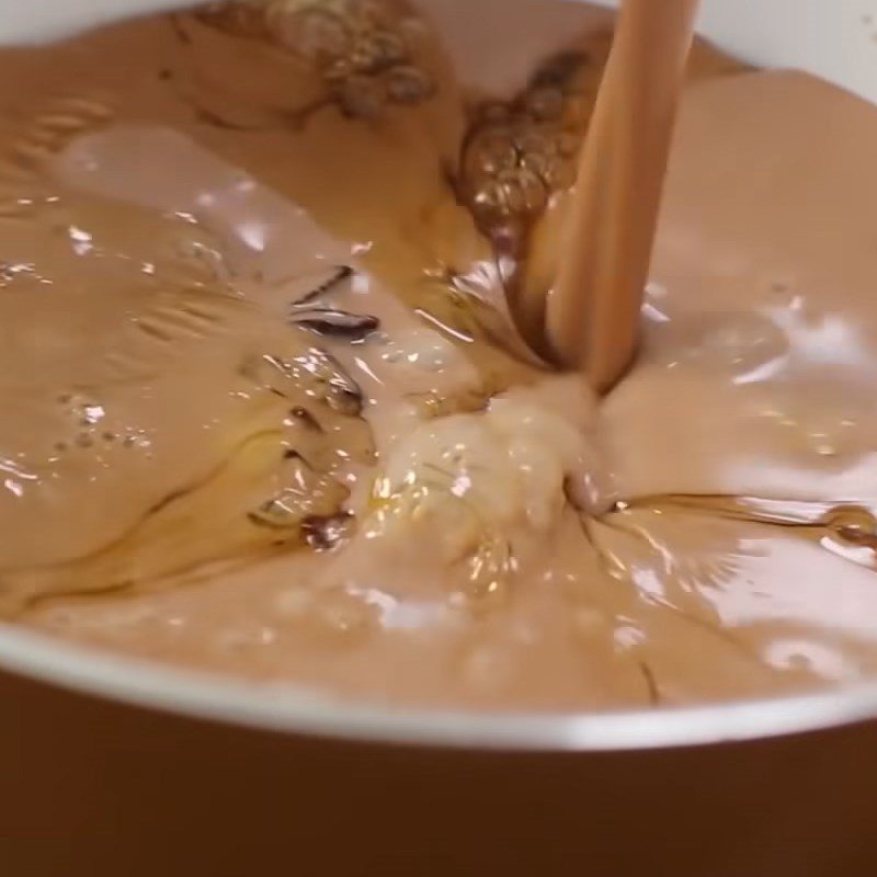 Step 2 Cook the cocoa and coconut cream mixture Western-style baked gan cake