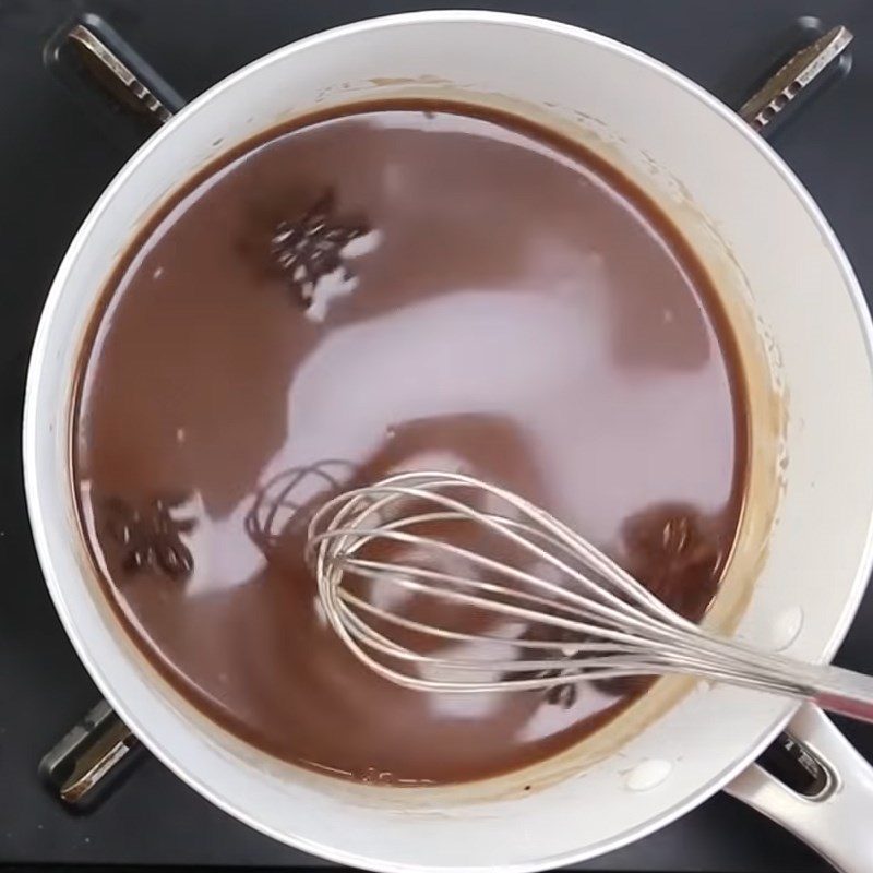 Step 2 Cook the cocoa and coconut cream mixture Western-style baked gan cake