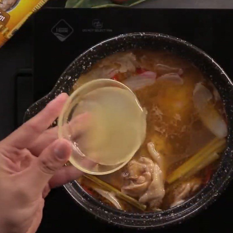 Step 3 Cooking the hot pot Spicy Sour Mushroom Chicken Hot Pot