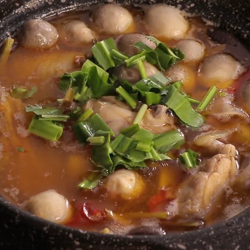 Step 3 Cooking the hot pot Spicy Sour Mushroom Chicken Hot Pot